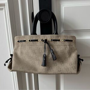 Dooney & Bourke Vintage Beige Canvas Handbag with Black Accents